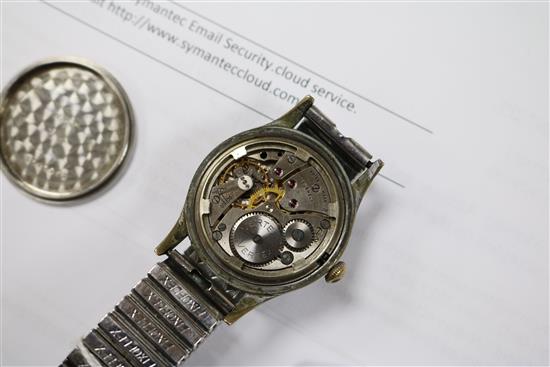 A gentlemans stainless steel Vertex military manual wind wrist watch.